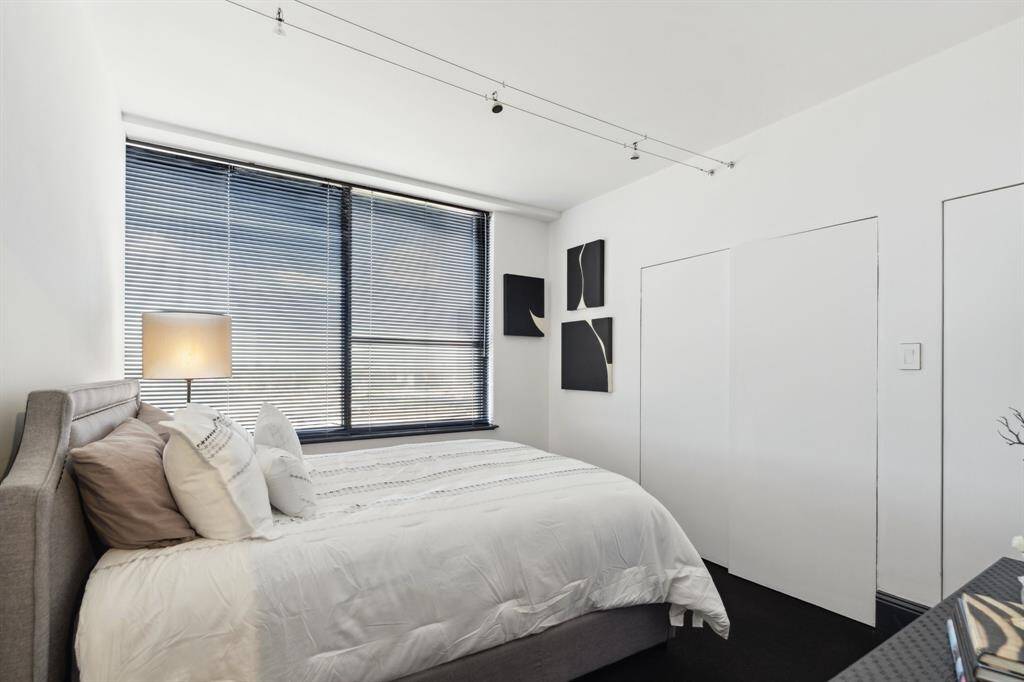 Guest bedroom with great closet space.