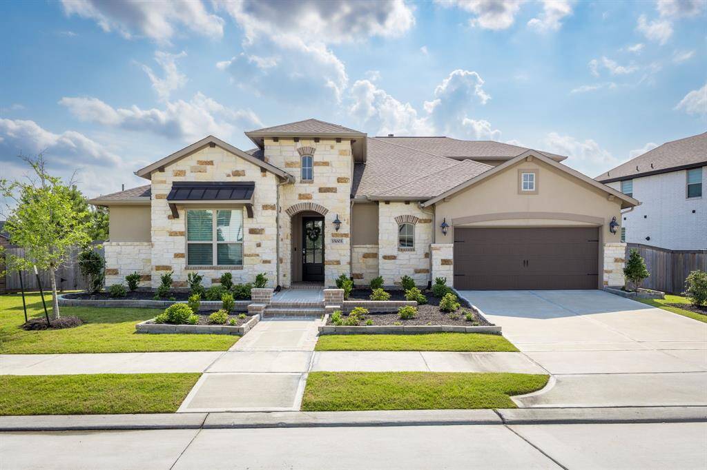 Beautiful 1.5 story home with a 3 car tandem garage! Move in ready no waiting. CyFair Schools!