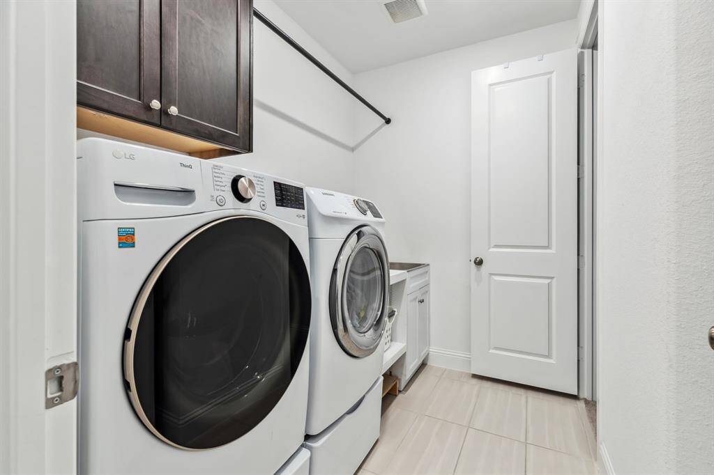 Laundry on first floor.  This laundry room is attached the the primary closet!  It's very convenient for laundry.