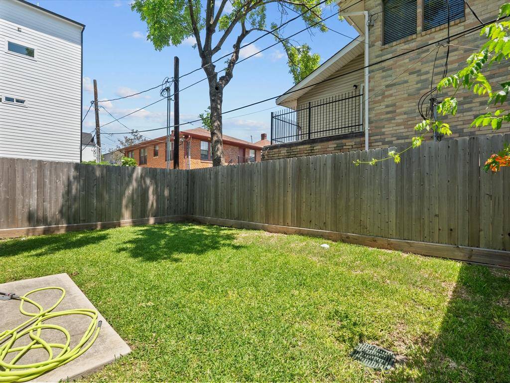 Spacious backyard with a privacy fence. A true rarity inside the loop!