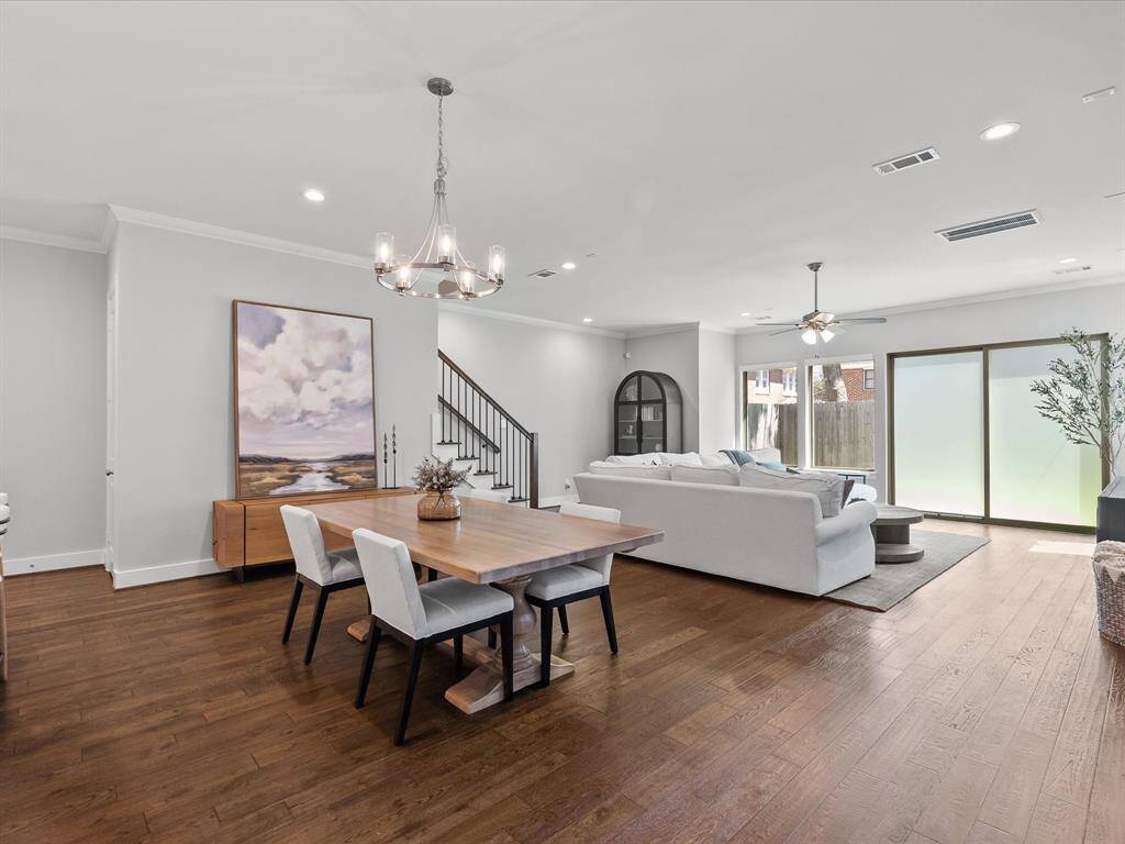 Enjoy the open-concept living and dining area with high end engineered hardwood floors. Ideal for entertaining!