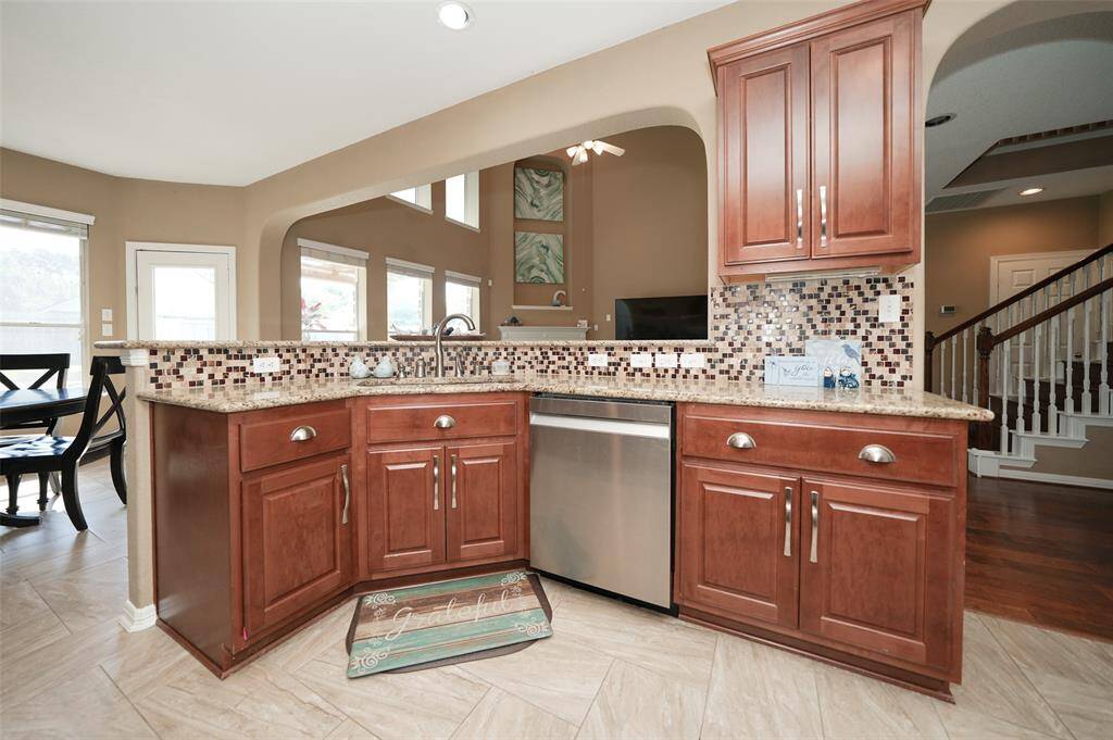 Kitchen opens to living room