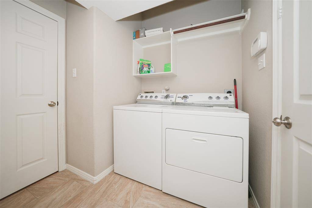 First floor oversize laundry and utility room