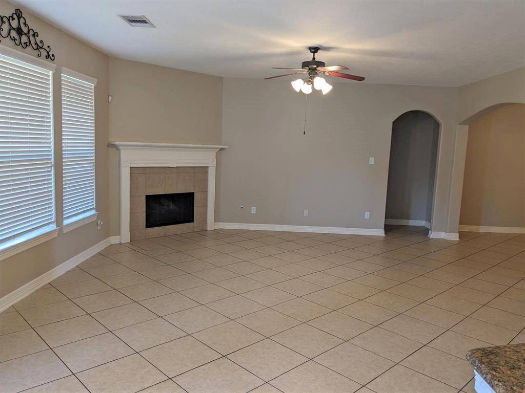 Cozy living room featuring a charming fireplace, perfect for relaxation and gatherings.