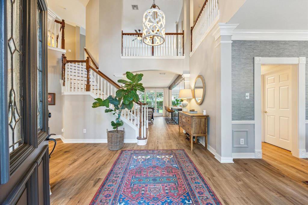 Step into welcoming entry with high ceilings.