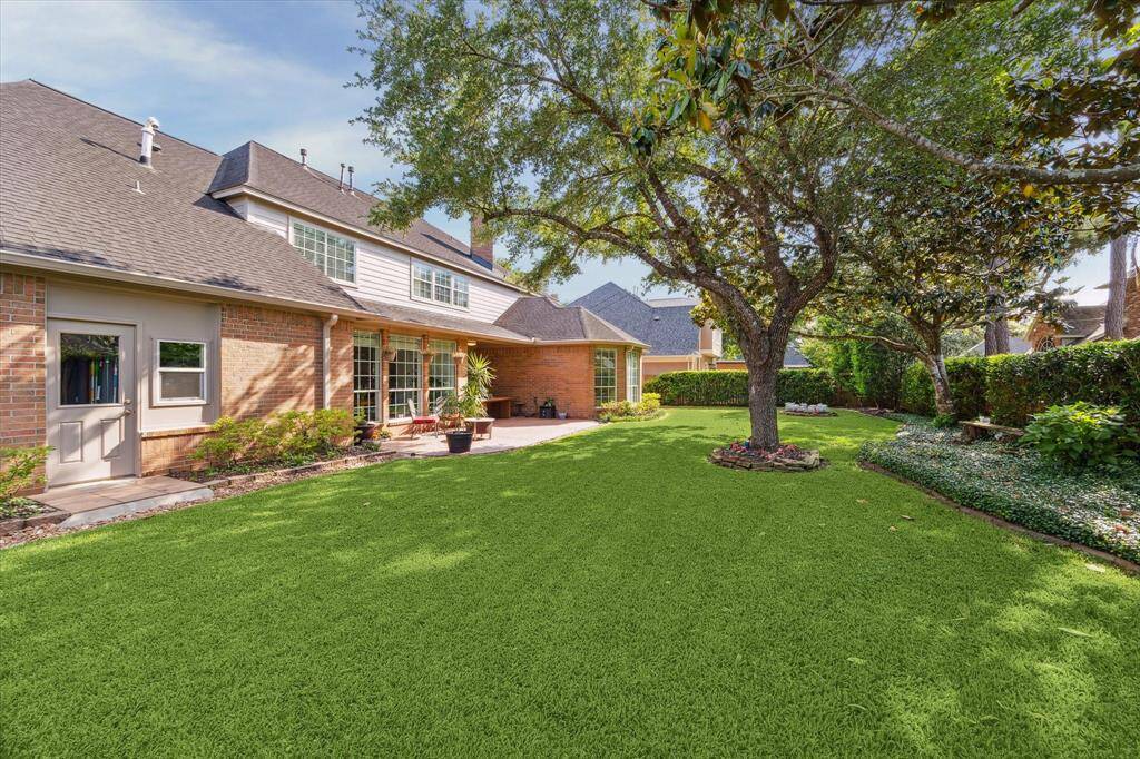 Beautifully landscaped backyard.