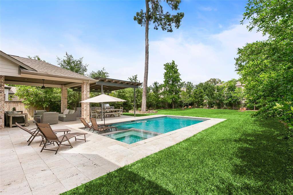 Expansive backyard offering privacy and space to play or entertain.