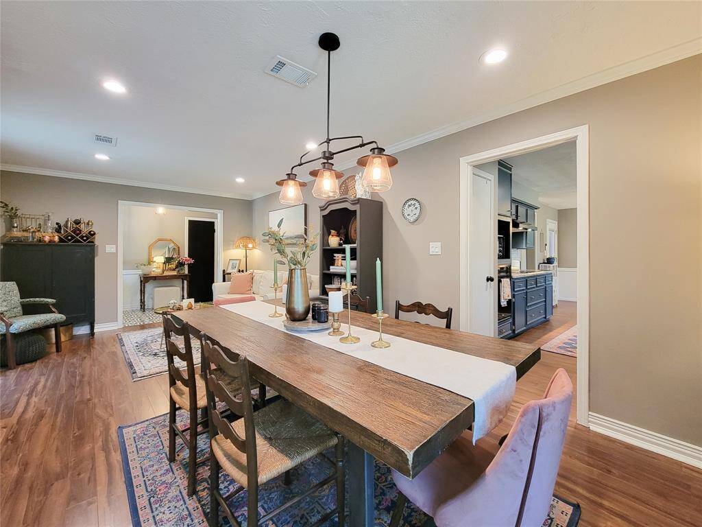 View from the far end of the dining room, this photo shows the inviting space to entertain before and after dinner.