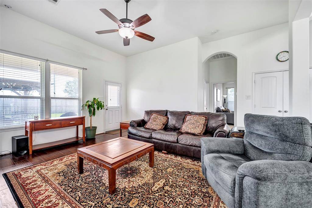 This listing features a spacious layout, hardwood flooring, and abundant natural light throughout the living space.
