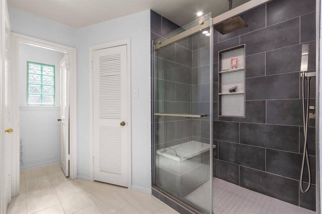 The updated primary bath is stunning! The shower is a do-not-miss moment!