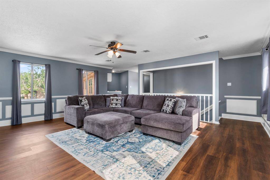 The upstairs gameroom is large enought for a pool table, if desired. It is currently furnished for comfy-cozy movie nights cuddled up on the couch.
