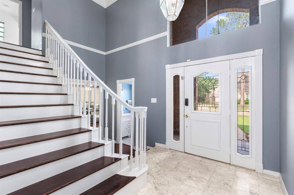 This is your view as you approach your entryway to greet guests. This space is full of natural light and creates a top-tier first impression for anyone visiting the home.