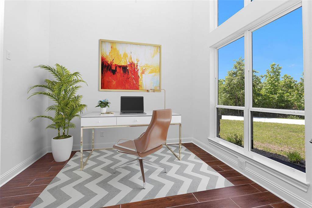 Flooded with natural light and framed by peaceful forest views, this private study offers a serene setting for focused work or creative inspiration.