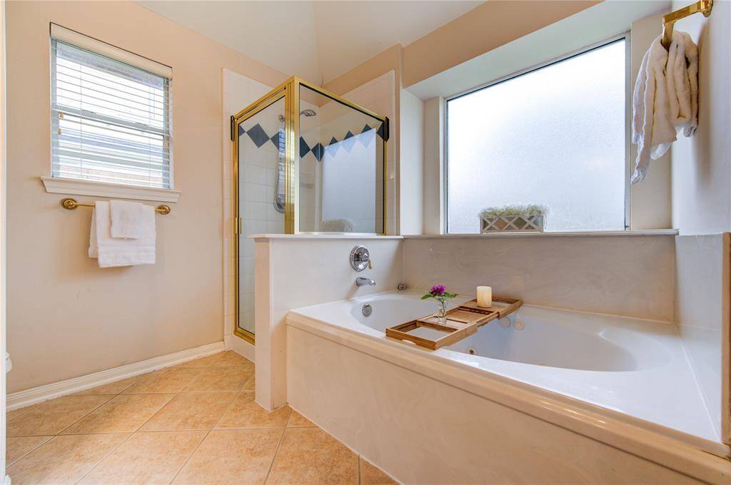 Jetted tub and separate shower make this ensuite very special.