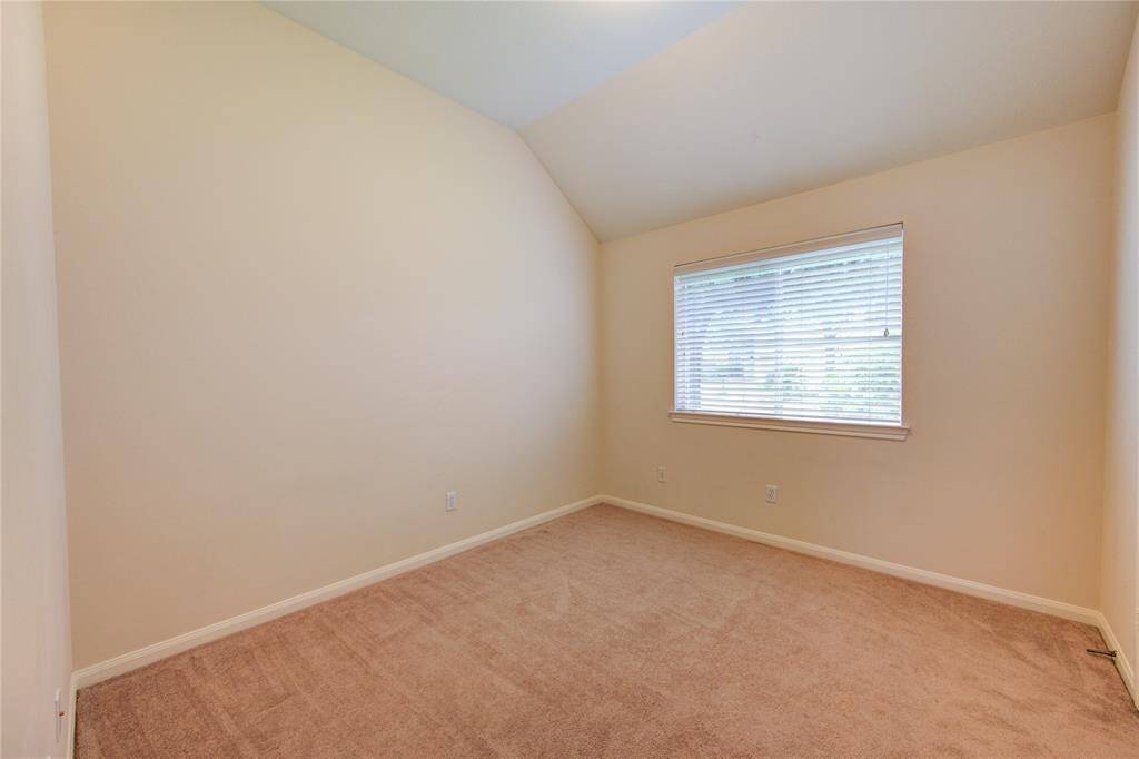 The second bedroom mirrors the other secondary bedroom.