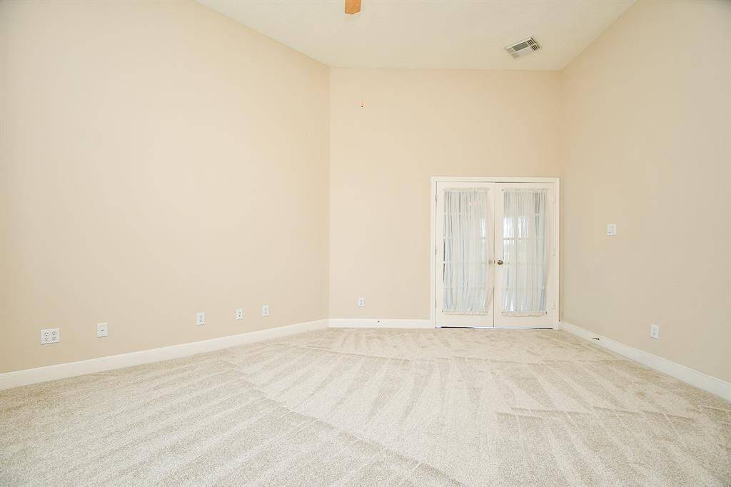 Oversized office with double French doors