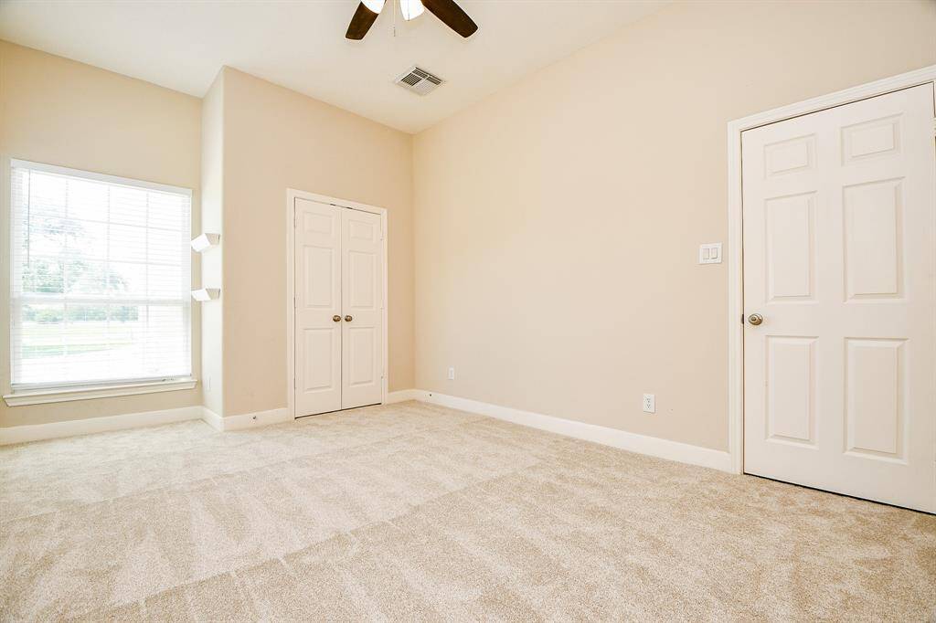 Secondary bedroom with new carpet