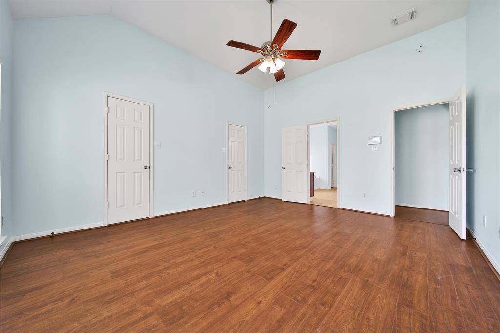 Primary retreat boasts high ceilings and lovely views!