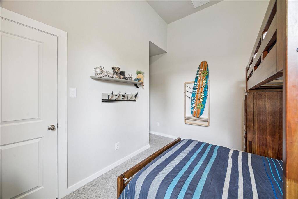 One of 4 bedrooms, this room has it's own private en suite full bathroom.