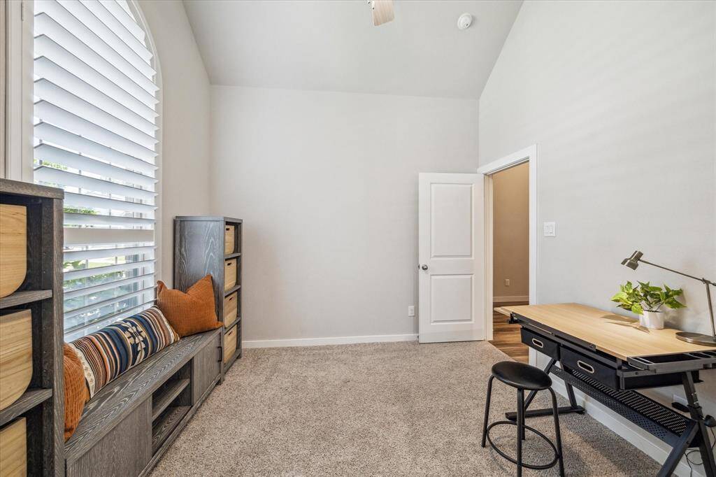 Bedroom 4 has it's own walk in closet and view to the street scape through plantation shutters.