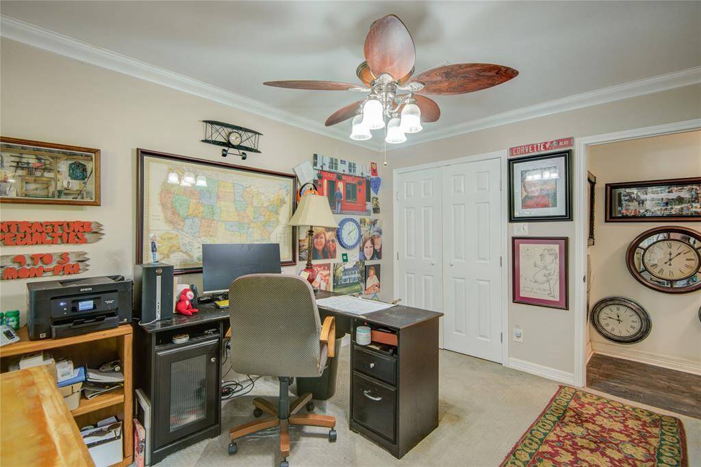 The third secondary bedroom, currently set up as a private home office, is tucked away at the end of the hallway for added quiet and privacy.