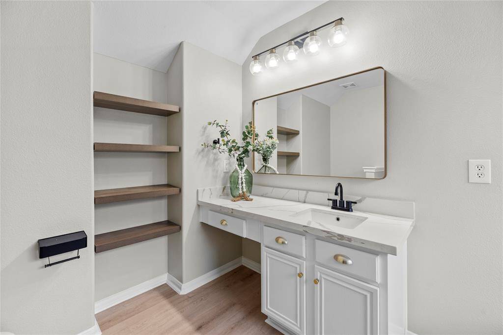 Primary bathroom with vanity.