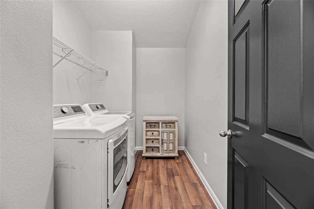 Laundry room located upstairs.
