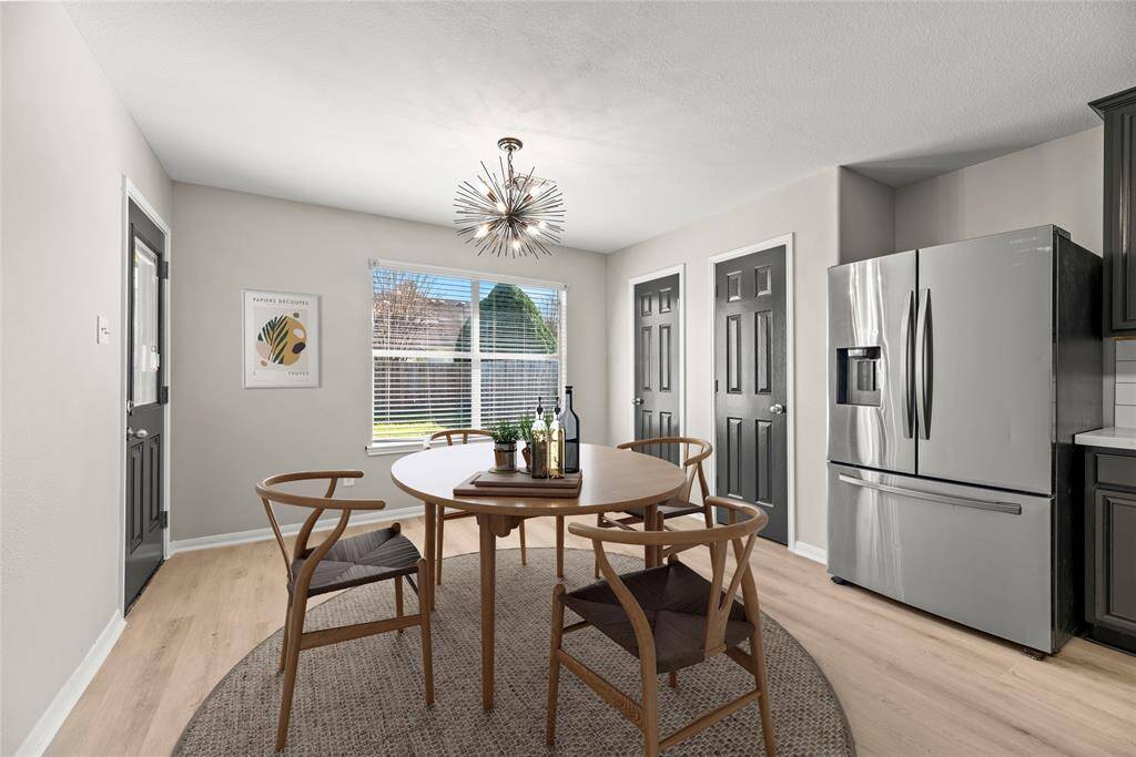Another view of kitchen.  This photos has been virtually staged.