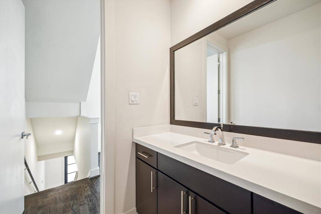 2nd floor half bath conveniently located on the same floor as the living room and kitchen which is just around the corner.