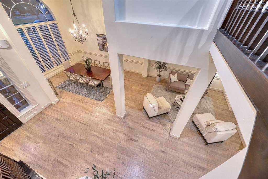 Seamless transitions between the formal sitting, dining, and living spaces—ideal for modern living and entertaining.