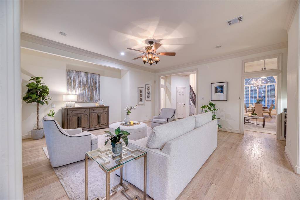 Grand living room with high ceilings and expansive windows that let in tons of light.