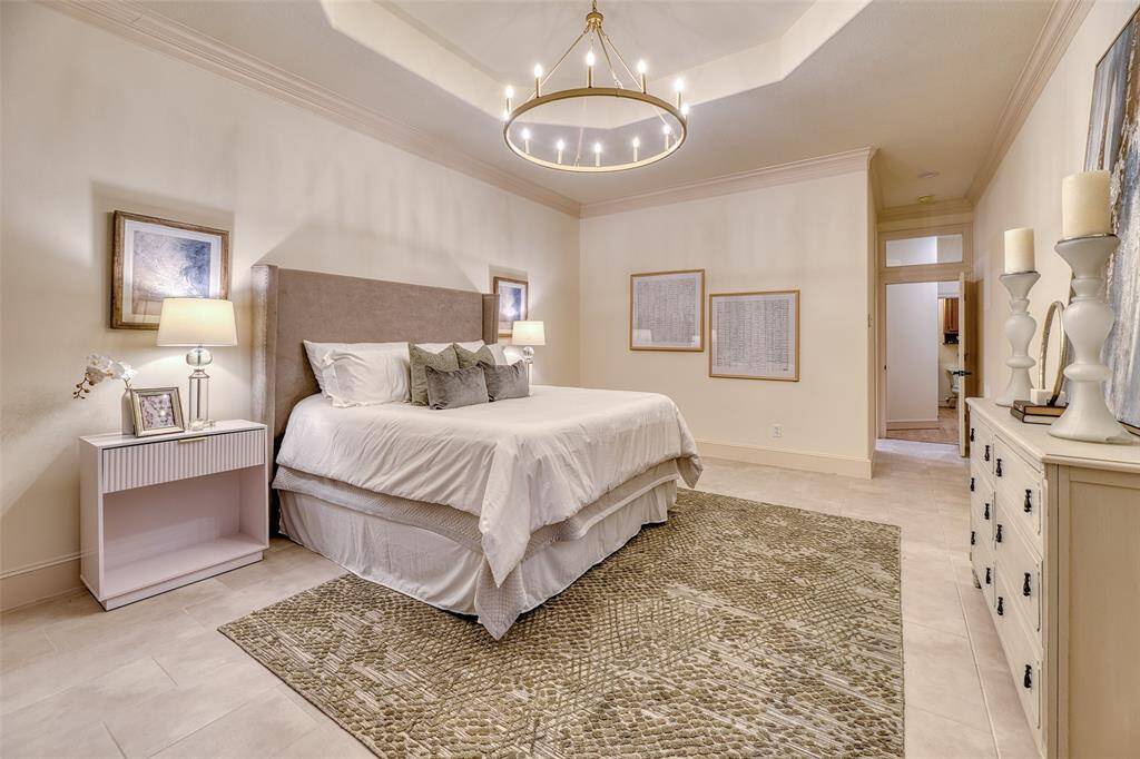 Primary bedroom has a a door to back patio for easy access to your outdoor oasis.