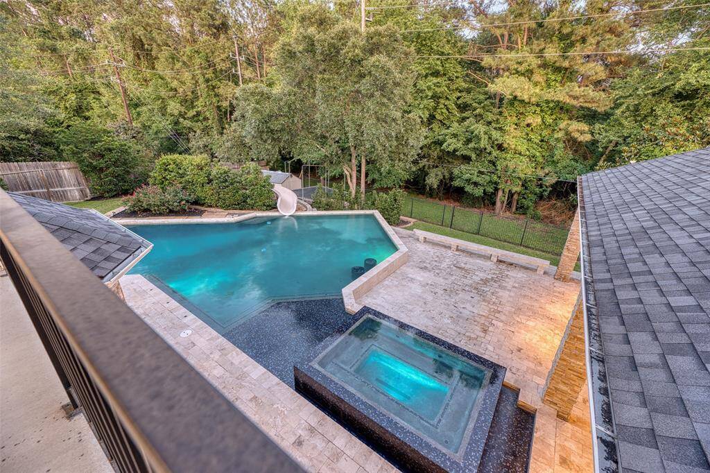 Oversized lot with no back neighbors, surrounded by mature trees for complete privacy.