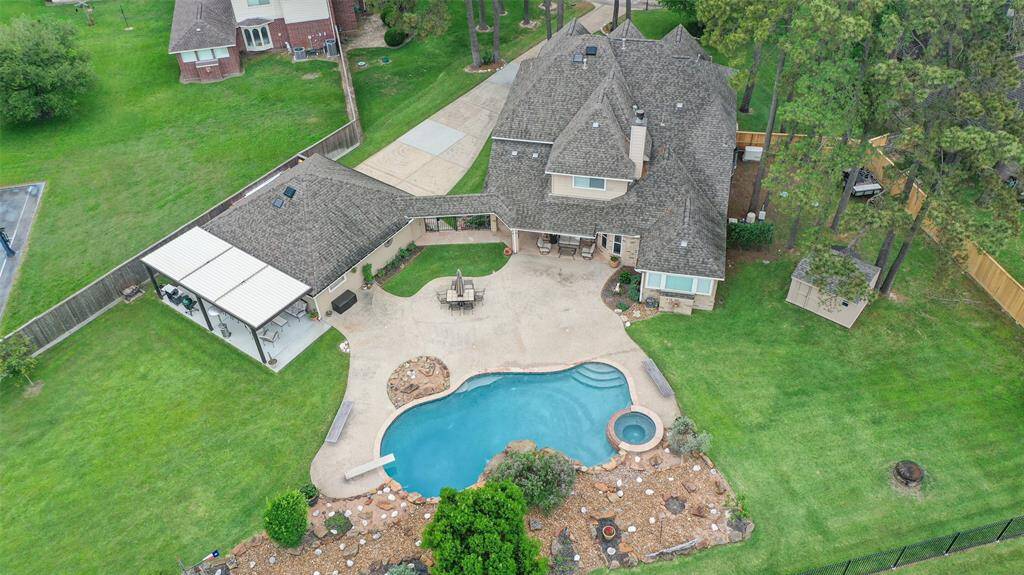 Discover your dream home on a serene cul-de-sac, nestled on 0.65 acres of tranquility.