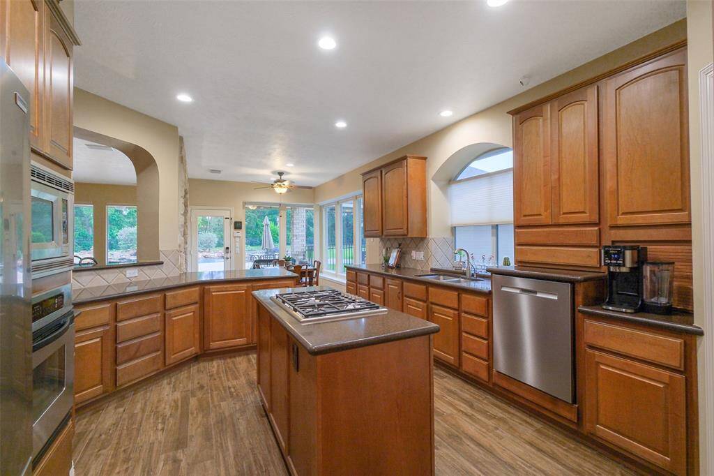 The chef in the home will love the large island kitchen with so much space for food prep and serving.