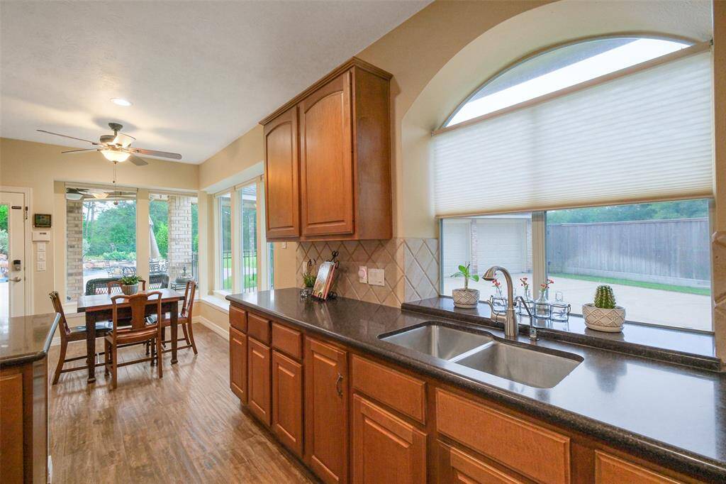 Flooded with natural light, the window above the undermount sink brightens the space beautifully.