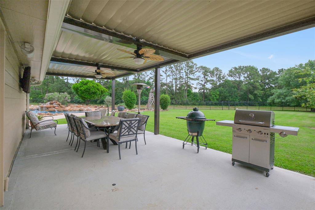 Enjoy a fantastic outdoor space behind the garage, ideal for BBQs and entertaining.