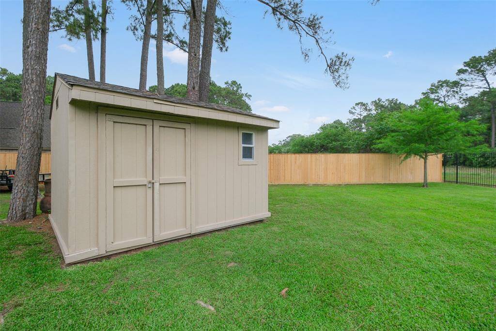 Extra storage awaits with this convenient shed.