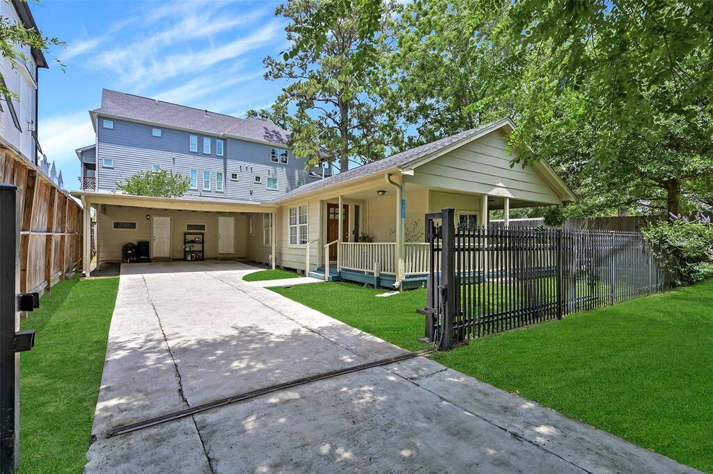 2 car covered parking, wrought iron electronic driveway gate and extended drive.