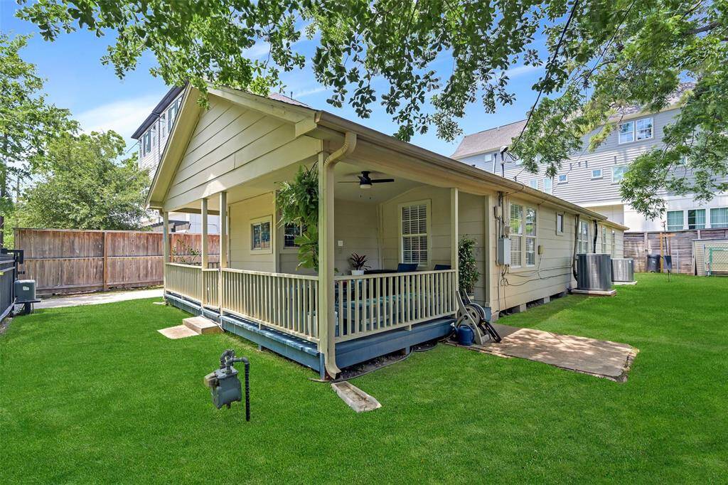 Wrap-around porch exudes timeless character, great for relaxing and entertaining.