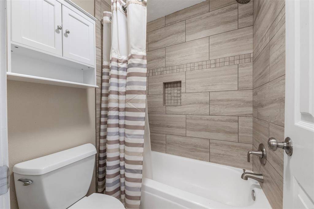 Full bath also has this updated shower.