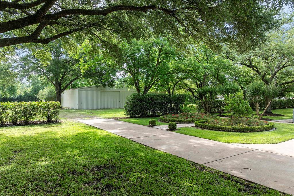 This pathway leads to a 63x50 workshop that includes an enclosed flex-room—ideal as a tack room for horse enthusiasts or ready to customize to suit your needs!