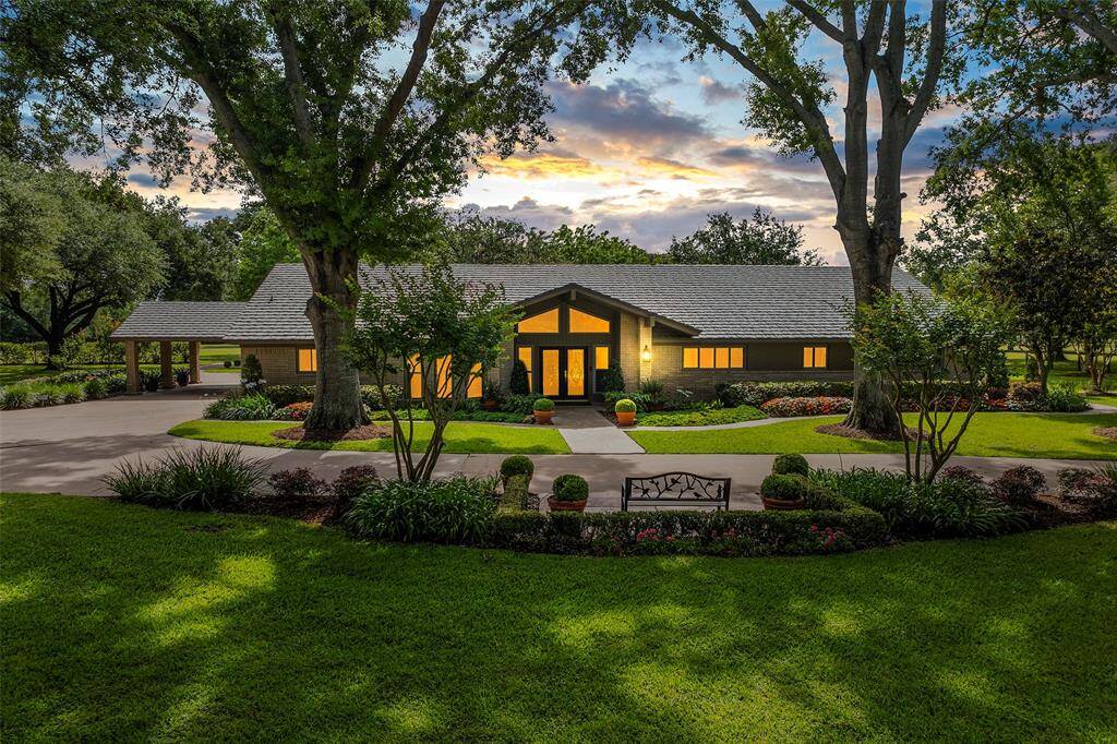 This wonderful home exudes a peaceful grace and looks as to whisper, come in and stay awhile as the day turns to dusk!