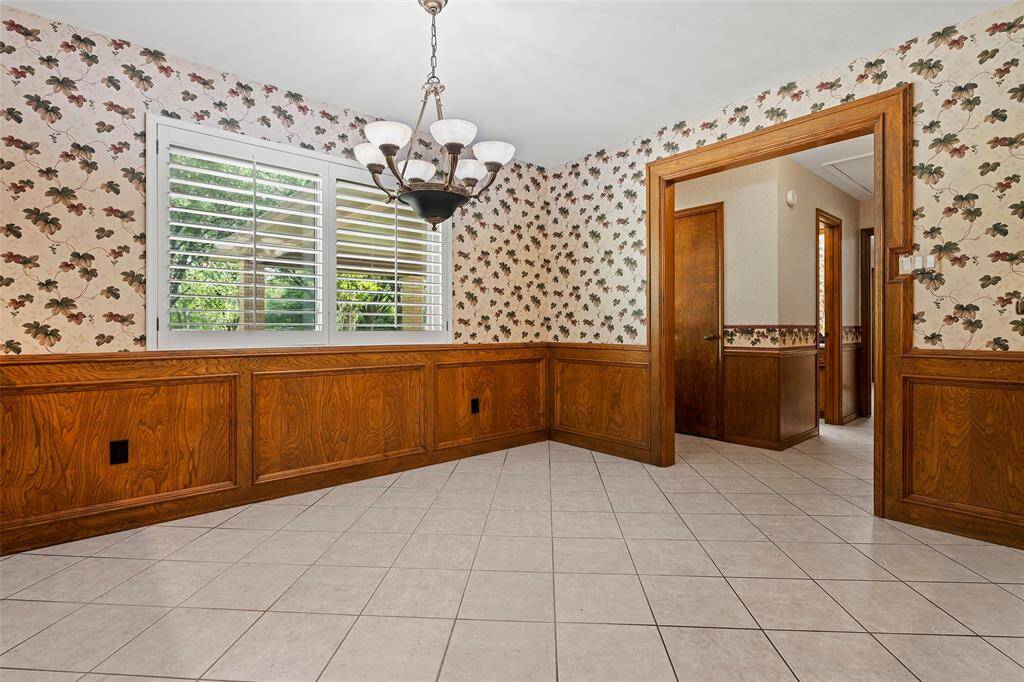 Tucked behind the bar area you will find this cozy breakfast space great for morning coffee, or just a quick bite to eat! The home has been updated with double-paned windows for added comfort!