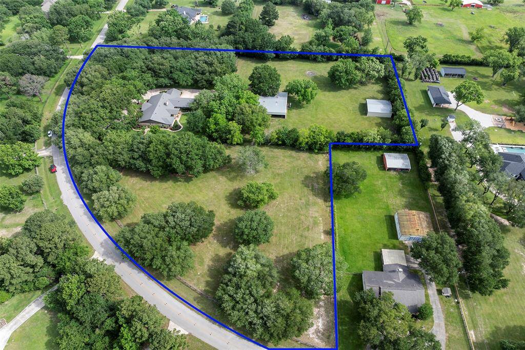 OH how we envy the birds that get this view everyday of this AMAZING almost 6-acre property with mature trees, and those open spaces that bloom annually with gorgeous bluebonnets!