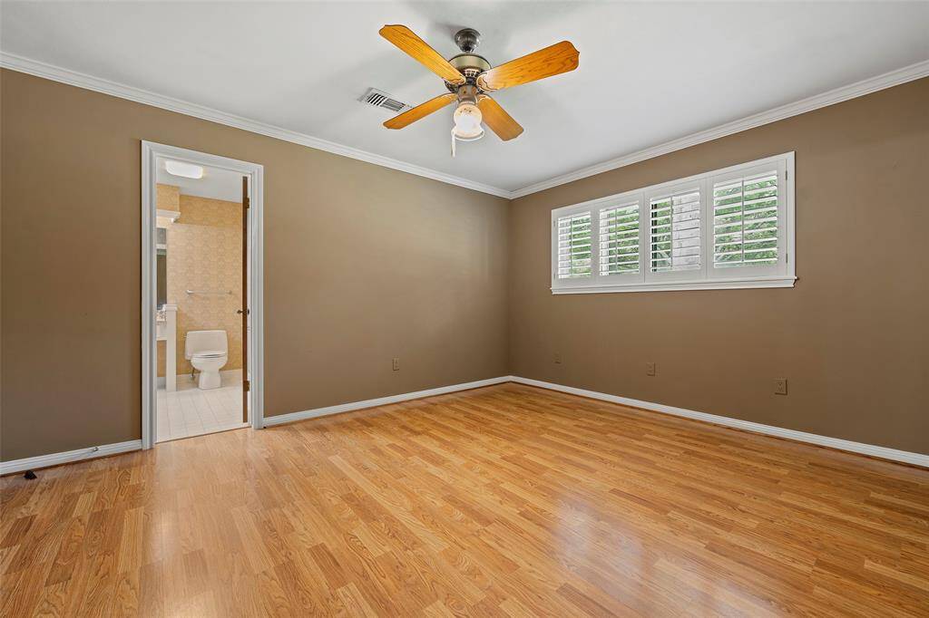 This room is quite relaxing!  We love the high windows as to not inhibit the placement of bedroom furniture, while still offering in the natural light!  This secondary also features an en-suite bath, ideal for an in-law suite, college kid returning to the nest, or live-in help!