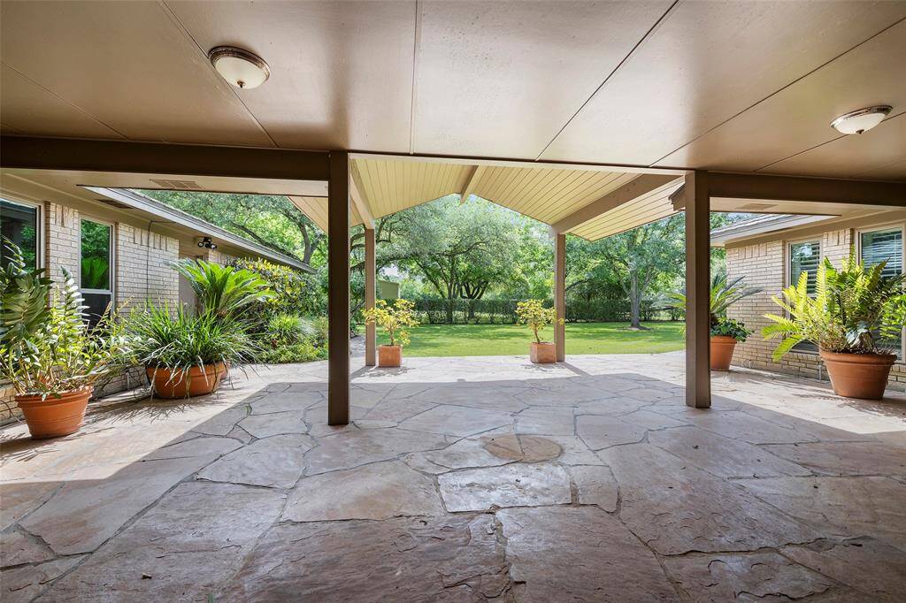 Imagine several areas set up for entertaining in this space!  Add a setee or two with a coffee table, a dining set for dinners al fresco, and maybe you can even dream up an outdoor kitchen!  The choice is yours!