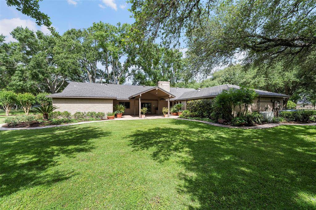 There is ample room for a pool on this property if you have dreams of a tropical oasis!