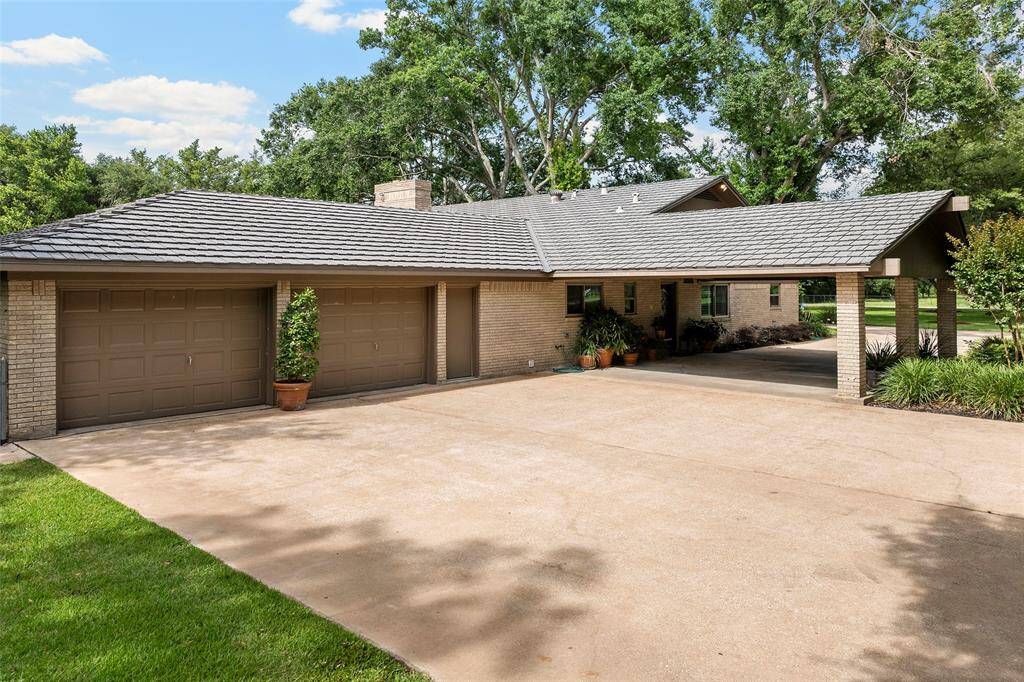 Drive through to the swing 2-car garage, perched perfectly on the side of the home as to not obstruct the beauty of this homes amazing curb appeal!