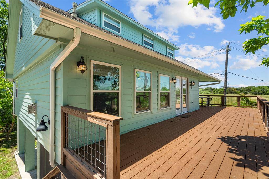 Welcome home to 180 Grove Rd. The front porch offers plenty of room to relax and enjoy the bay view.